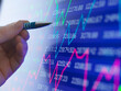© Connect Images - Stock trader viewing performance of shares on screen