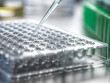 © Connect Images - Pipetting samples from clinical trail into multi well