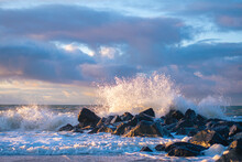 Wave Crashing At Rocks At Danish Coast. High Quality Photo