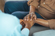 © Dragana Gordic - Close up african american man hands holding upset depressed woman, comforting wife for supporting frustrated disappointed girlfriend having life problem, showing love and support.