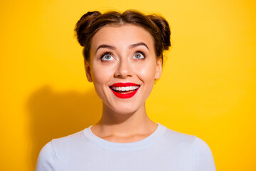 Wall Mural - portrait of lovely sweet young female see black friday promotion above her head isolated on yellow c