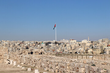 Wall Mural - Amman, Jordan - Jordanian flag from amman citadel hill