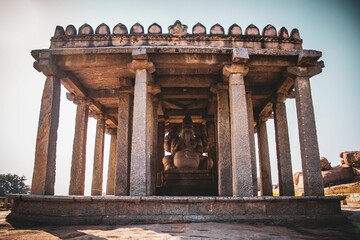 Sticker - Scenic view of temple ruins in Hampi, Karnataka, India, with the sculpture of Ganesha