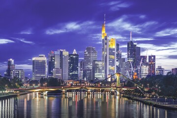 Poster - Skyline of the modern city of Frankfurt from the Main river at night