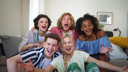 Wall Mural - Diverse group of friends with mixed races having fun together and taking selfie indoors, Friendship and lifestyle concepts