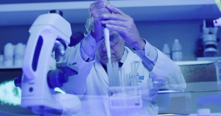 Poster - Mature laboratory scientist using dropper or pipette to fill test monkeypox tubes and examine chemical reactions in ultraviolet lit lab. Biochemist, genetic engineer and doctor doing medical research