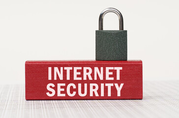 Poster - On the reports there is a red block with the inscription - Internet security and a lock.