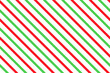 © Iryna - Candy cane seamless pattern. Christmas striped red green background. Xmas prints with diagonal lines. Abstract geometric texture. Cute holiday wrapping paper. Vector illustration.