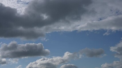 Wall Mural - beautiful sunny dramatic cloudscape. 4k stock video time-lapse of amazing sunny clear blue sky with 