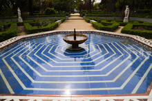 Mediterranean Style Tiled Fountain In A Park In Seville.
