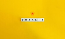 Customer Loyalty Banner And Concept. Text On Letter Tiles On Yellow Background. Minimal Aesthetics.
