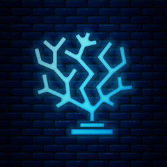 Sticker - Glowing neon Coral icon isolated on brick wall background. Vector