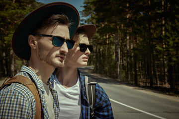 Canvas Print - guys travelling by hitchhiking