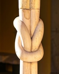 Vertical shot of a carved wooden sculpture in Benevento, Italy