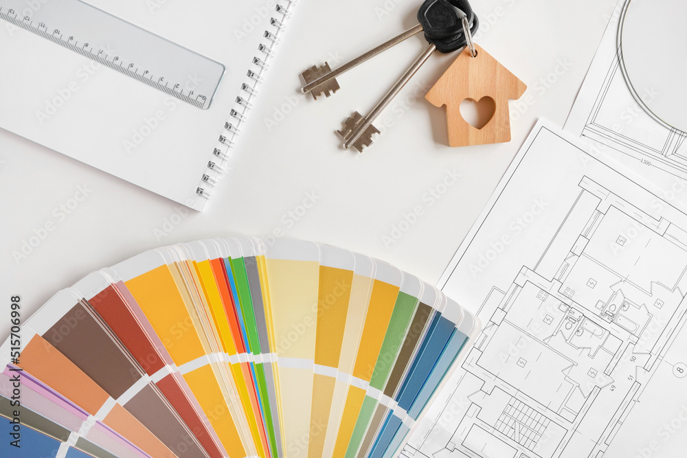 Hands choosing Colors of Interior Design from the Color Guide ...