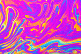 Fototapeta Tęcza - Psychedelic multicolored background abstract. Rainbow colors. patterns background. Photo macro shot of soap bubbles..