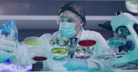 Canvas Print - Biochemist using dropper or pipette with multiple samples. Searching for infections cure. Laboratory scientist testing monkeypox chemical reactions in petri dishes on glass table for medical research