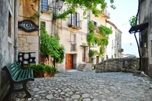 A Narrow Street Between The Old Houses Of Guardia Sanframondi, A Village In The Province Of Benevento, Italy.