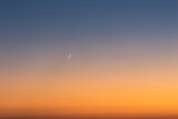 Fototapeta Zachód słońca - Sunset on clear sky with moon and the star.