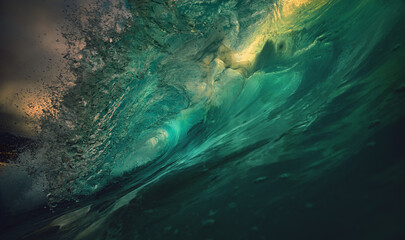 Wall Mural - big sunset rough ocean shorebreak wave inside crest view