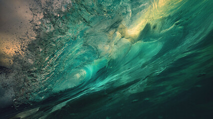 Wall Mural - big sunset rough ocean shorebreak wave inside crest view
