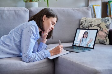 Young woman making video call with doctor, online meet at home