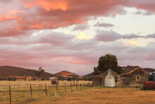 Old Sheds At Sunset On A Farm