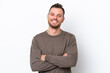 © luismolinero - Young Brazilian man isolated on white background keeping the arms crossed in frontal position
