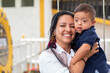 © Anderson Piza - Portrait of a child with Dawn syndrome and his mother. Concept of inclusivity and diversity.