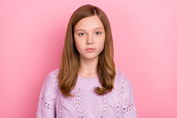 Portrait of attractive content red-haired teen girl wearing knitwear pullover isolated on pink pastel color background