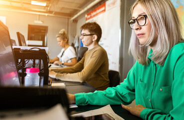 Wall Mural - Engineer designer working on desktop computer in factory