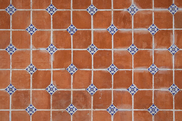 traditional mexican red wall adornments of handmade hand painted talavera poblana tiles in atlixco, 