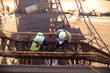 © Kings Access - Tope picture of construction miner workers conducting self risk assessment knowing as take five or taking control step prior to work of each task
