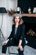 © Julia Jones - a girl in a beret holds her hair with her hands and looks into the frame