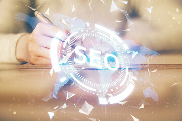 Aufkleber - Multi exposure of woman's hands making notes with SEO icon. Concept of Search engine optimization