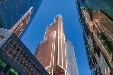 Wall Mural - Moscow, Russia, on July 3, 2022. Urban view. Skyscrapers of Moscow city district against the background of the blue sky