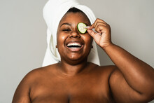 Happy Curvy African Woman Having Skin Care Spa Day - People Self Care Lifestyle Concept