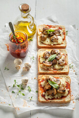 Wall Mural - Crunchy toasts made of mushrooms, pepper and cheese.