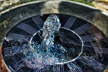 The Water Coming Out Of This Solar Water Fountain Almost Looks Like Glass.  Floating Fountain In Our Garden In Windsor In Upstate NY.