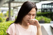 © 9nong - sick allergic middle-aged woman having runny nose with cold, flu or allergy