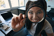 © Viacheslav Yakobchuk - Joyous female office worker looking at something through loupe