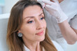Forehead skin rejuvenation procedure with mesotherapy injections