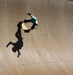 Skateboarder on ramp  with strong shadow 