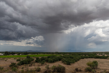 Dramatic sky in Tucson, Arizona, near Mission San Xavier del Bac during monsoon season