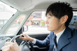 © 茂輝 田代 - 運転する男性
