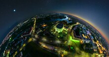 Circular Rotation With Twisting Of Night Landscape Of City From The Height Of Flight Into Tiny Planet