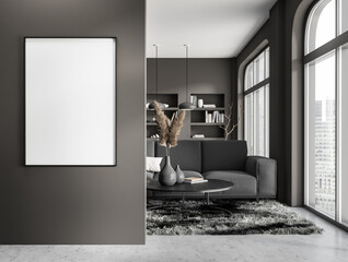 Dark living room interior with empty white poster, coffee table