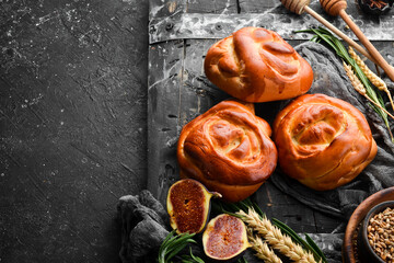 Freshly baked sweet homemade buns. Baking from rye and flour. Top view. Rustic style.