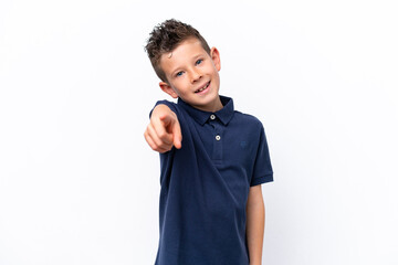 Little caucasian boy isolated on white background pointing front with happy expression