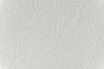 White wall with plaster background. Plaster and putty grain surface texture. Finishing, decor concept.